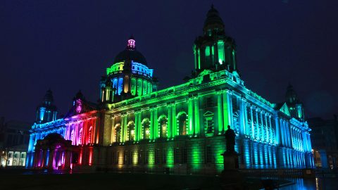 Belfast City Hall lit up in rainbow colours