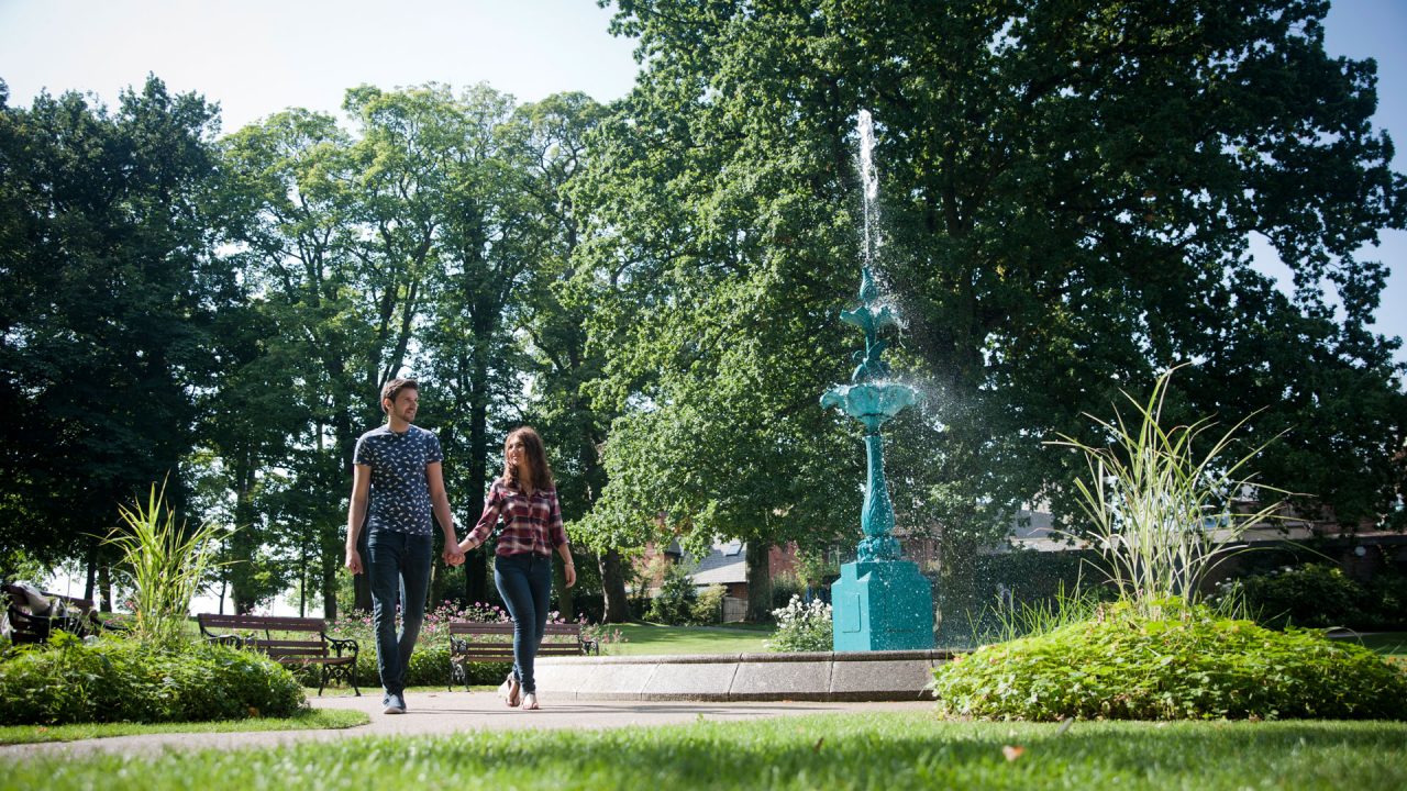 Couple Walk Through Lisburn Castle Gardens