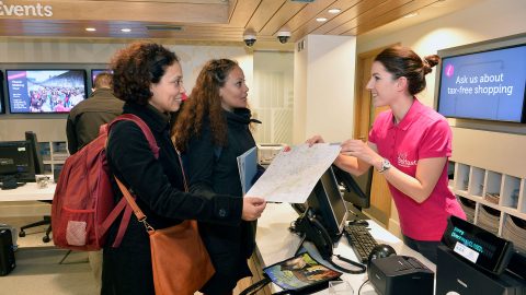Staff giving Tourist Information at Visit Belfast Welcome Centre