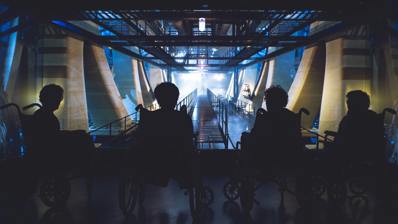 Visitors using wheelchairs at Titanic Belfast