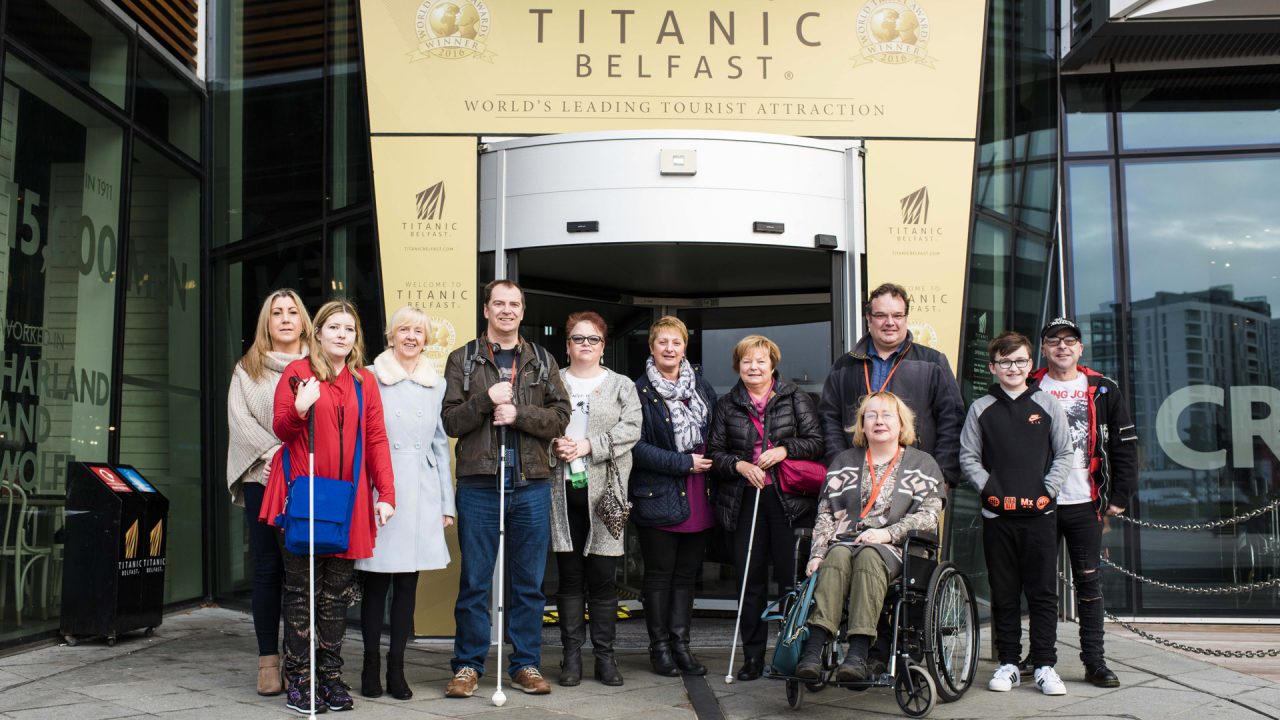 Visitors using wheelchairs while visiting Titanic Belfast